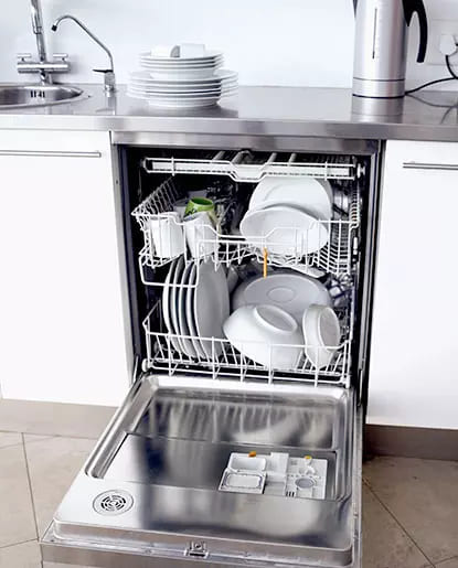 Close Up Of A Dishwasher Filled Dishes Close Up Of A Dishwasher Filled Dishes